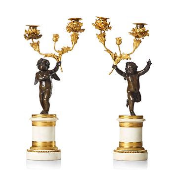 68. A pair of Louis XVI late 18th century two-light candelabra.