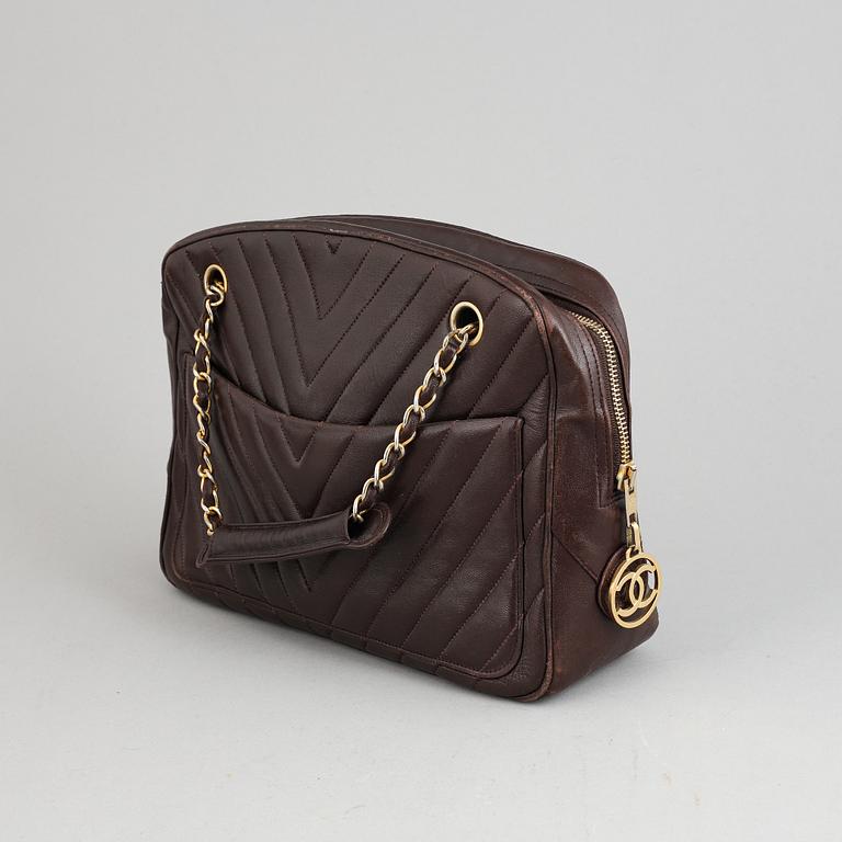 Chanel, a burgundy leather handbag, 1989-91.