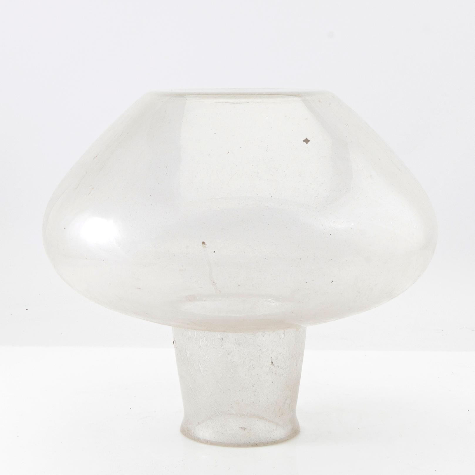 Glass dome for exterior lighting.