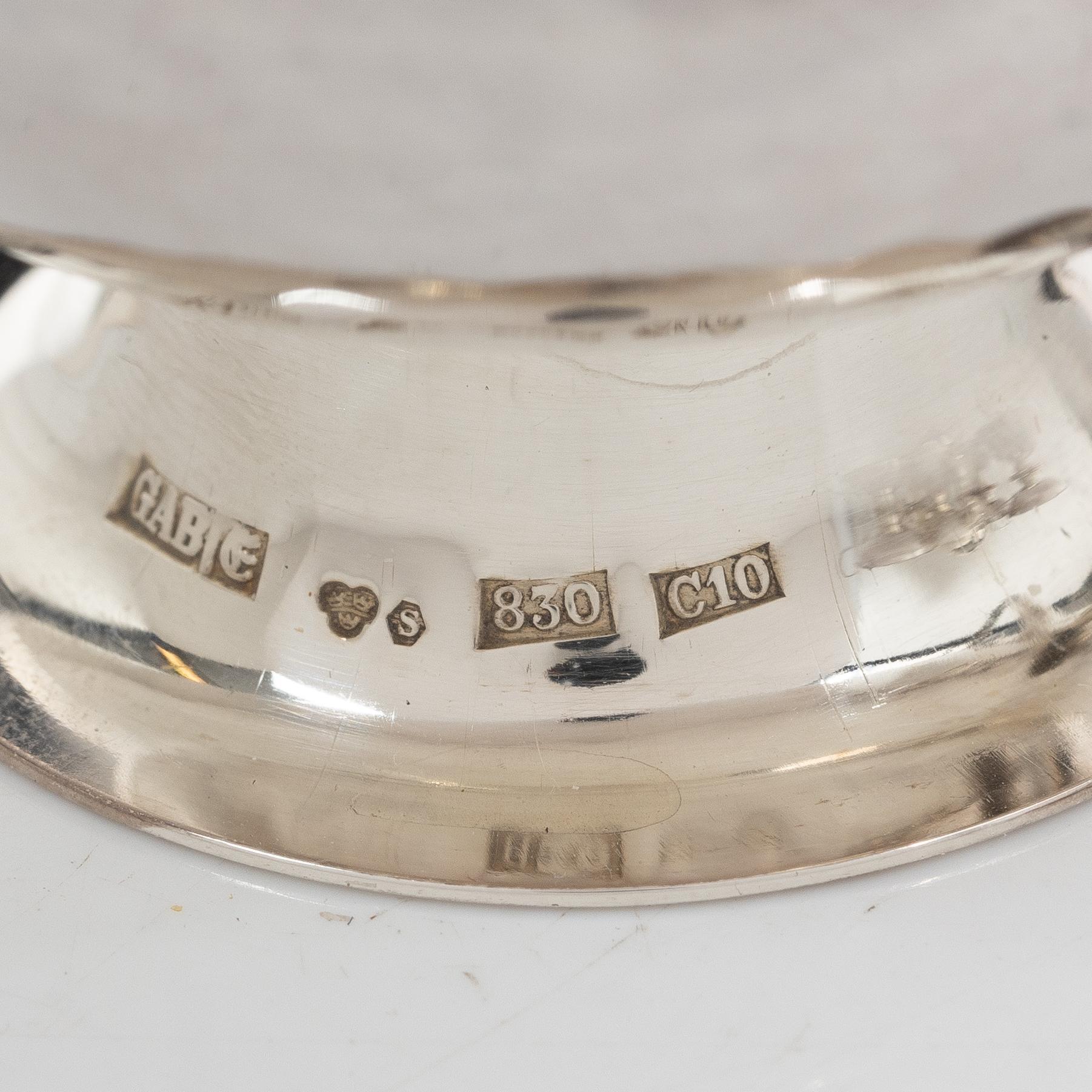 A set of twelve Swedish silver punsch cups, including Ceson, Gothenburg 1989.