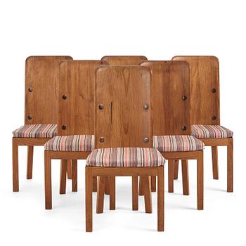 324. Axel Einar Hjorth, a set of six stained pine "Lovö" chairs, Nordiska Kompaniet, Sweden, 1930s.