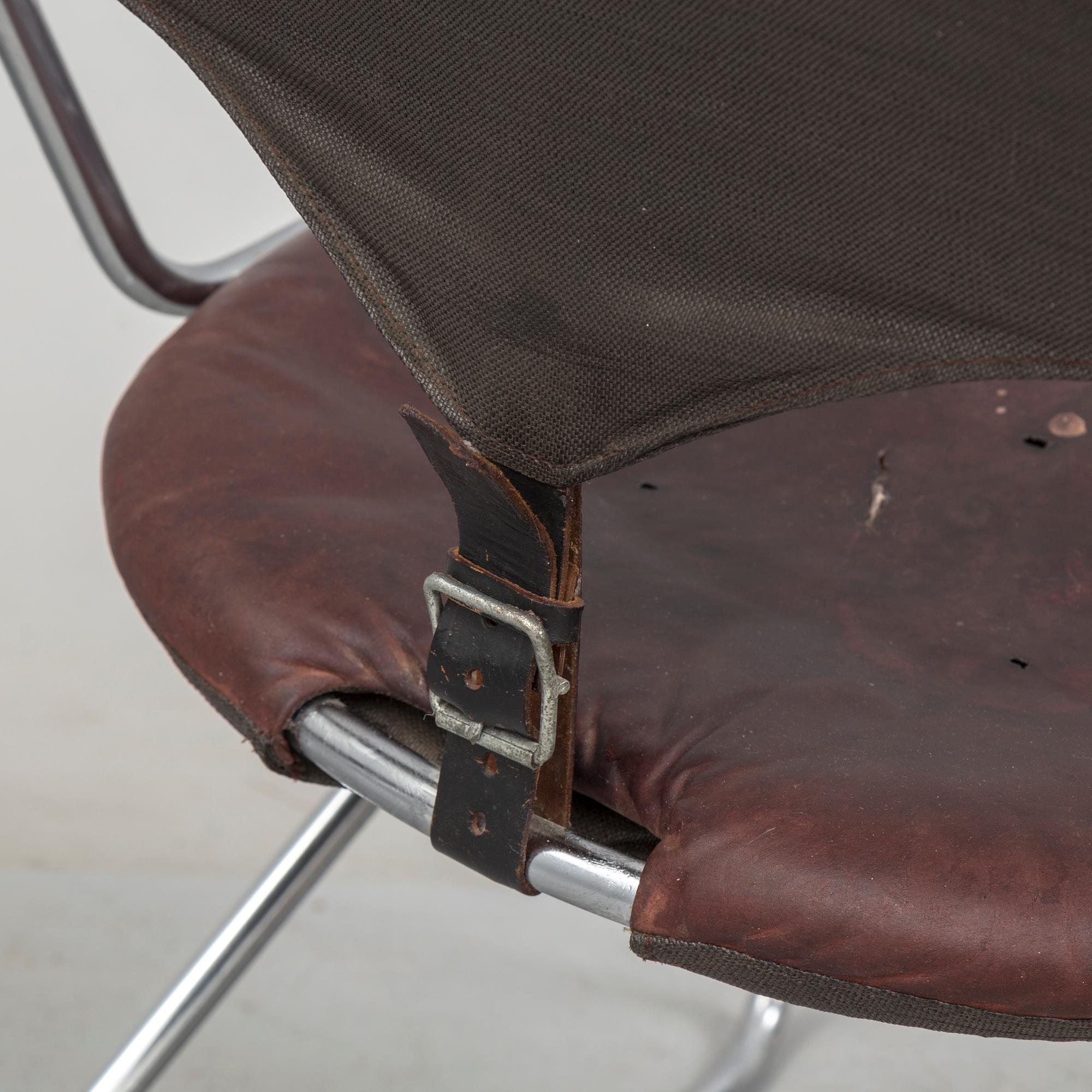 A set of four chairs by Sam Larsson, Dux, late 20th century.