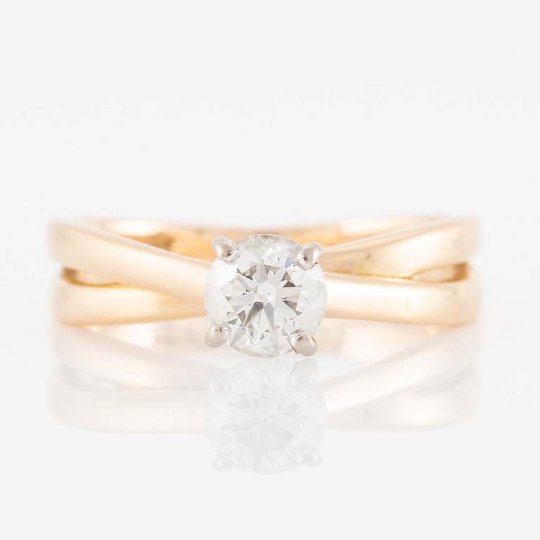 Ring 18K gold set with a round brilliant-cut diamond, by Or Du Monde Paris.