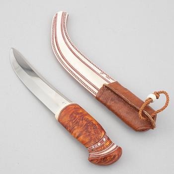 Erik Fankki, a reindeer horn knife, signed and dated 2004.