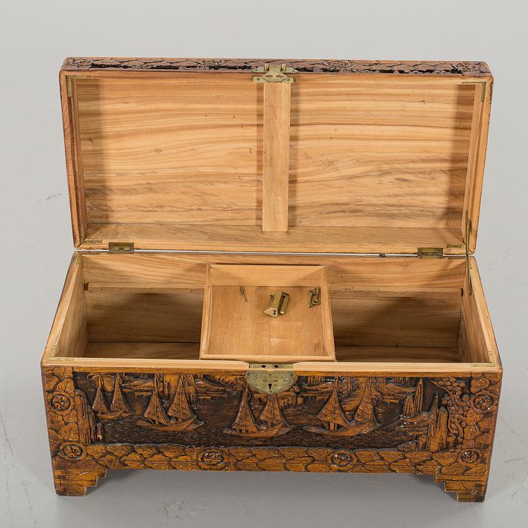 A late 20th Century Oriental Carved Camphor Wood Chest.