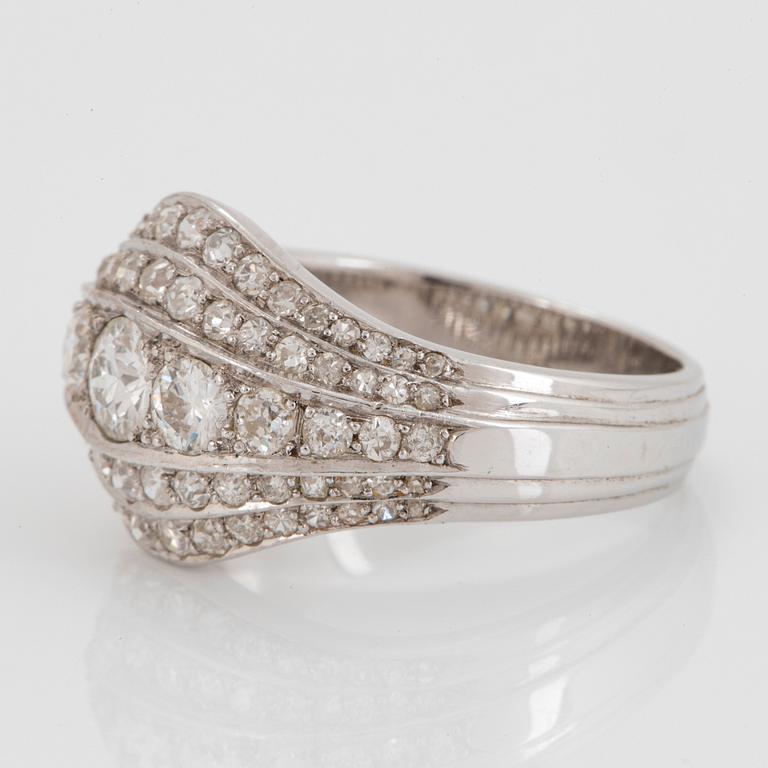 An 18K white gold ring set with old- and eight-cut diamonds.