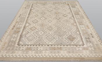 A Kelim carpet, 290 x 208 cm.
