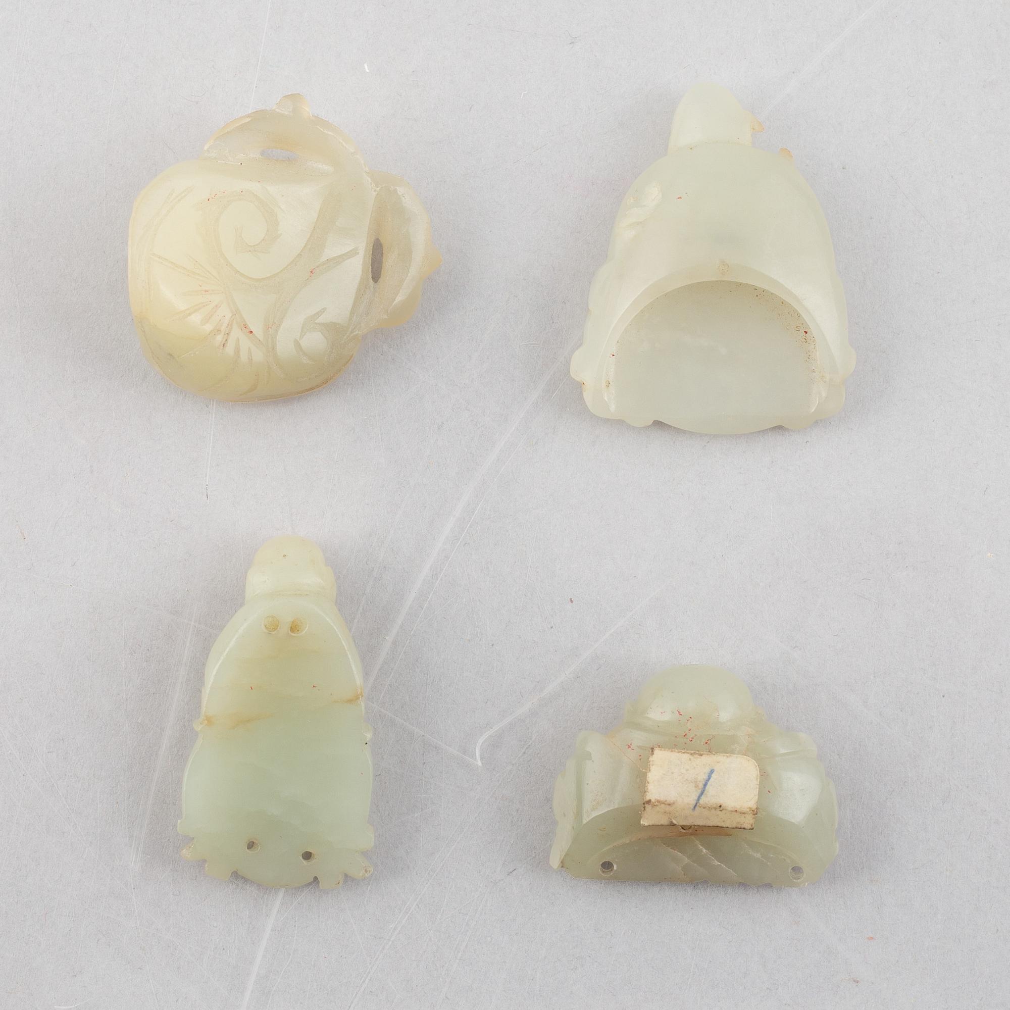 A group of eight Chinese stone charms, 20th century.