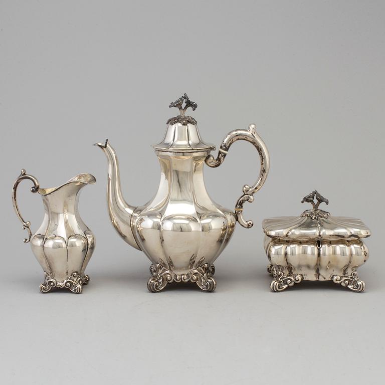 A three-piece coffee service, parcel-gilt and silver. Maker's mark CG Hallberg, Stockholm, 1925.