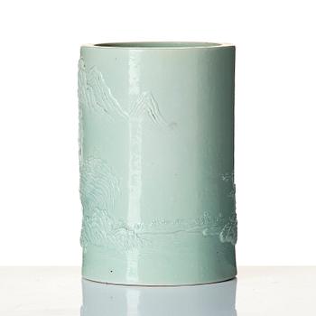 A pale green glazed brush pot, Qing dynasty, 19th Century.