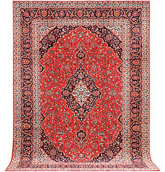 A Kashan carpet, a. 360 x 245 cm.