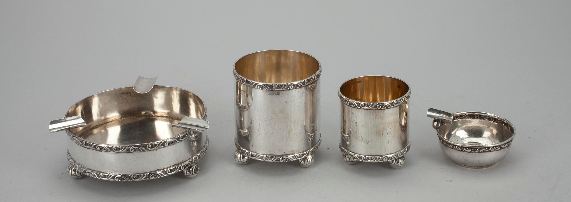 CIGARETTSET, 4 st, silver, Veljekset Sundqvist ja Oskar Lindroos, Helsinki 1907 ja 1921. Vikt tot. 588 g.