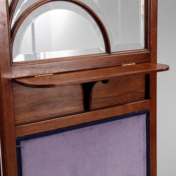 An early 20th century folding screen.