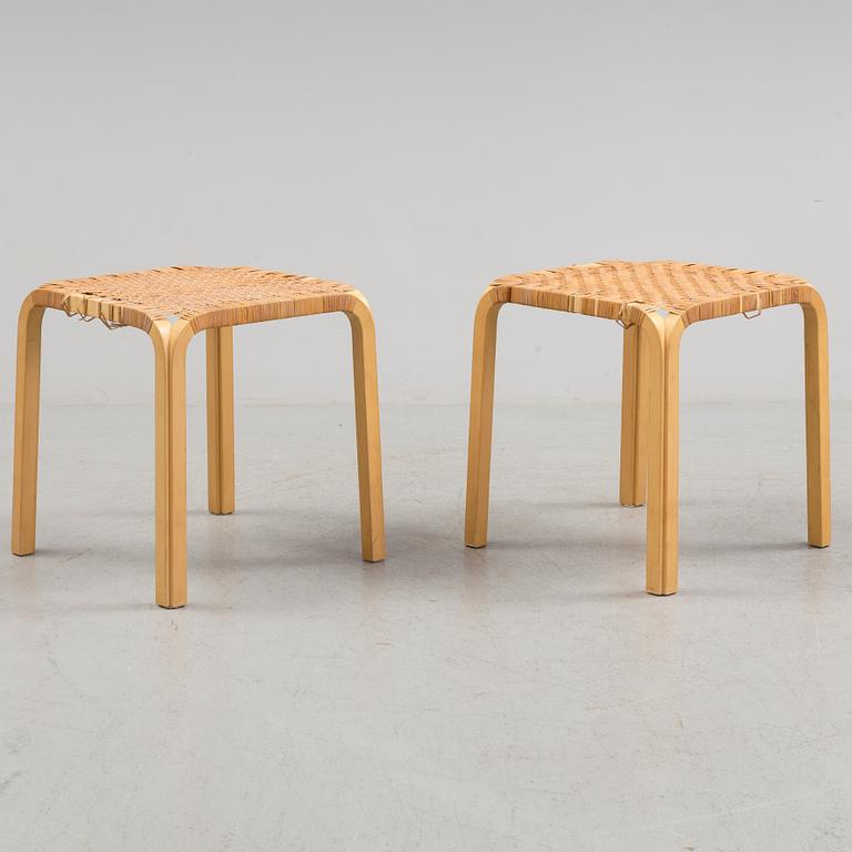 A pair of 1950s / 60s Alvar Aalto Y 61 stools.