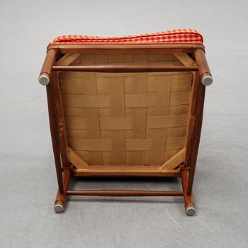 A pair of Gustavian style armchairs with one stool, second half of the 20th Century.