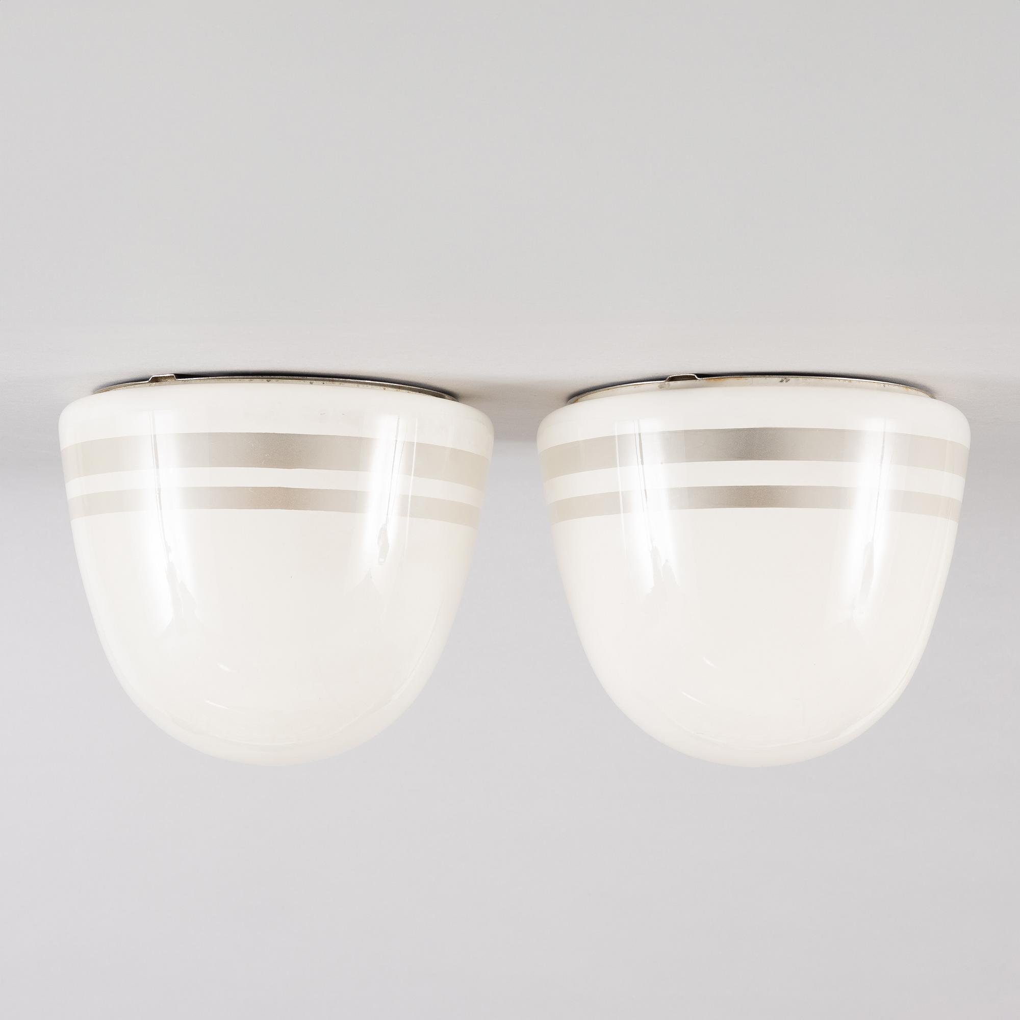 Harald Notini,  a pair of ceiling lamps, version of model "10148", Arvid Böhlmark's Lamp Factory, 1930s.
