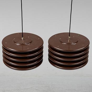 A par of 1970's ceiling lights.