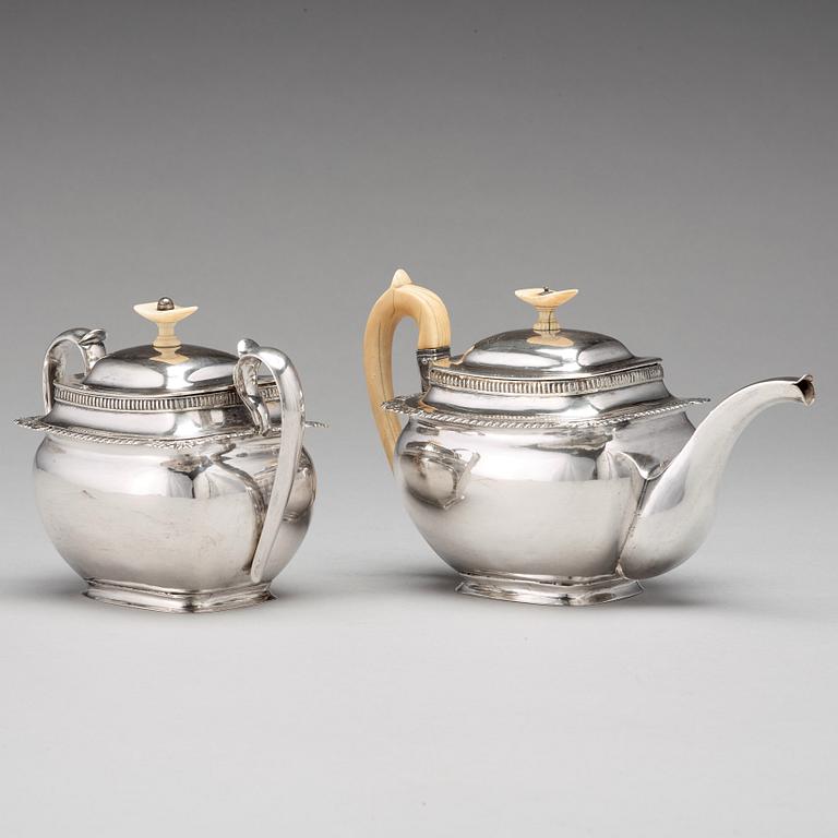 A Baltic 19th century parcel-gilt silver tea-pot and sugar casket, mark of Reinhold Eckert, Riga 1828.