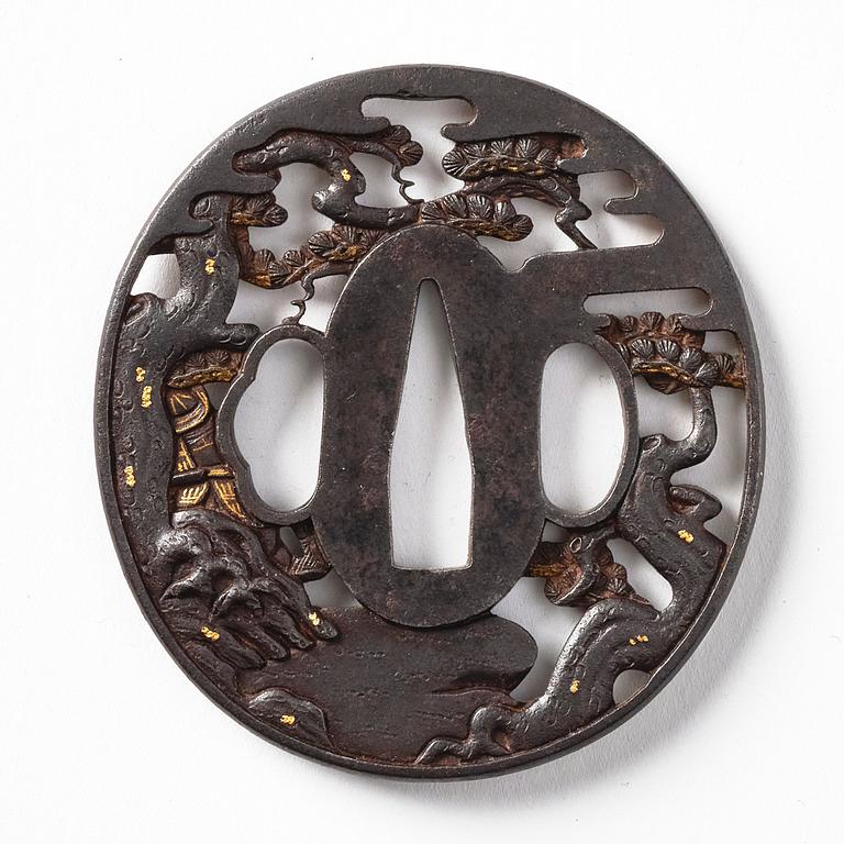 A Japanese bronze Tsuba, Edo period, circa 1820. Soten school.