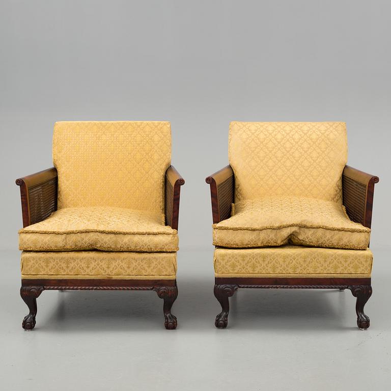 a pair of chippendale style armchairs from the 1930's/-40's.