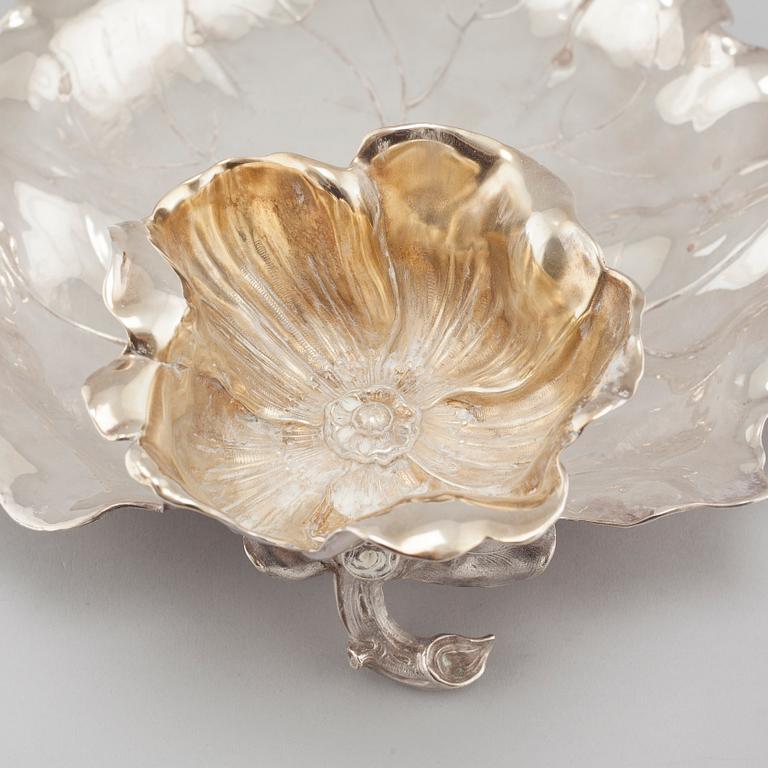 A silvered metal serving dish, early 20th century.