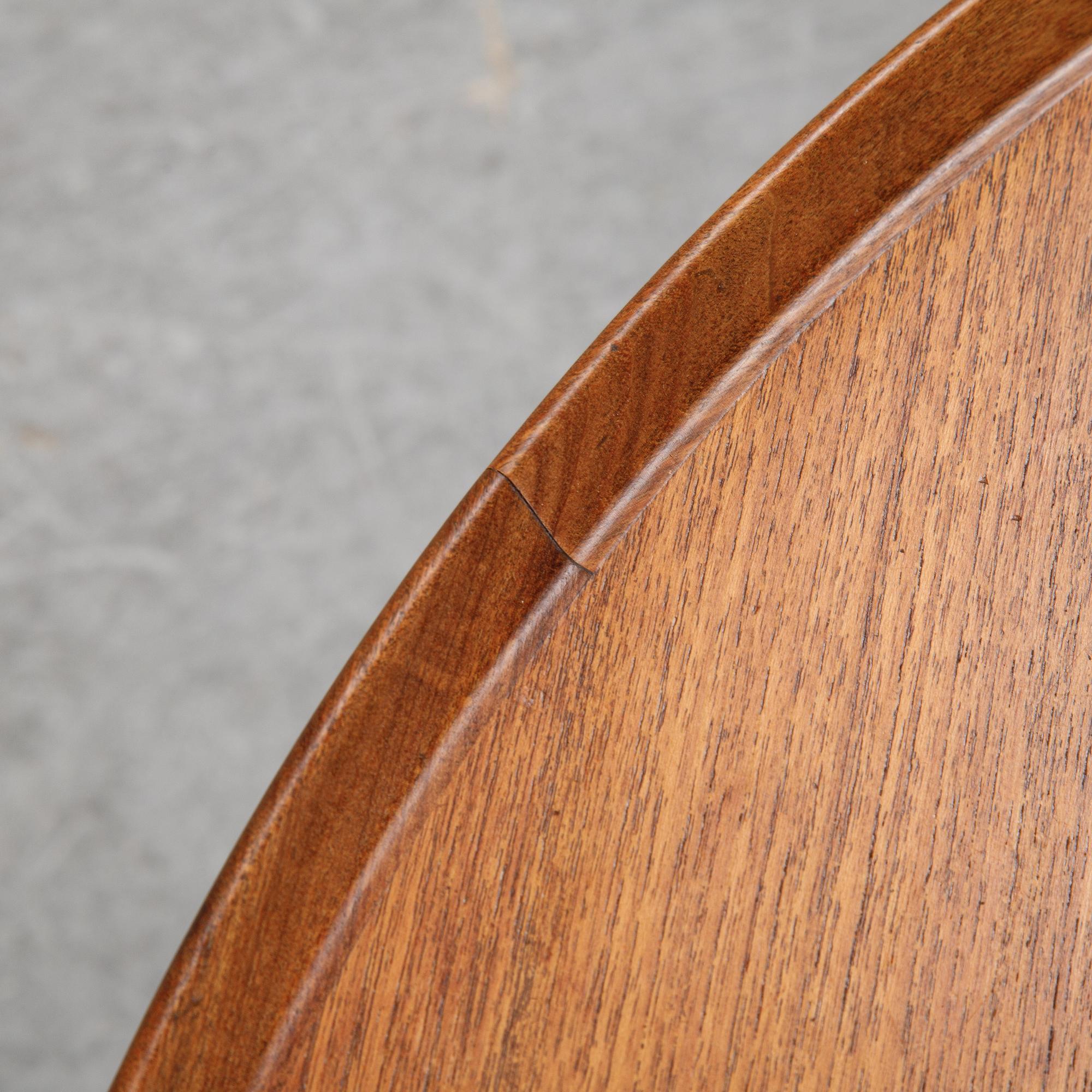 A teak veneered coffee table, 1950's/1960's.