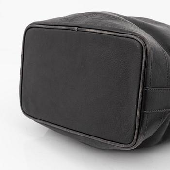 Kenzo, a black leather bucket bag.