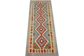 A runner carpet, Kilim, c. 287 x 80 cm.