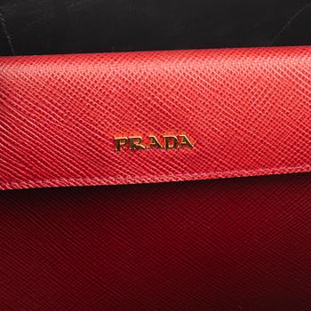 Prada, A red Saffiano Tote Bag.