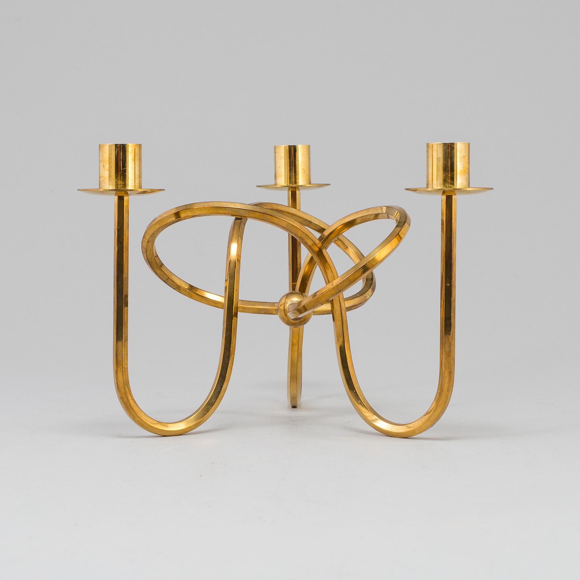 JOSEF FRANK, ljusstake, mässing ”Vänskapsknuten”, Firma Svenskt Tenn, 1900-tal.