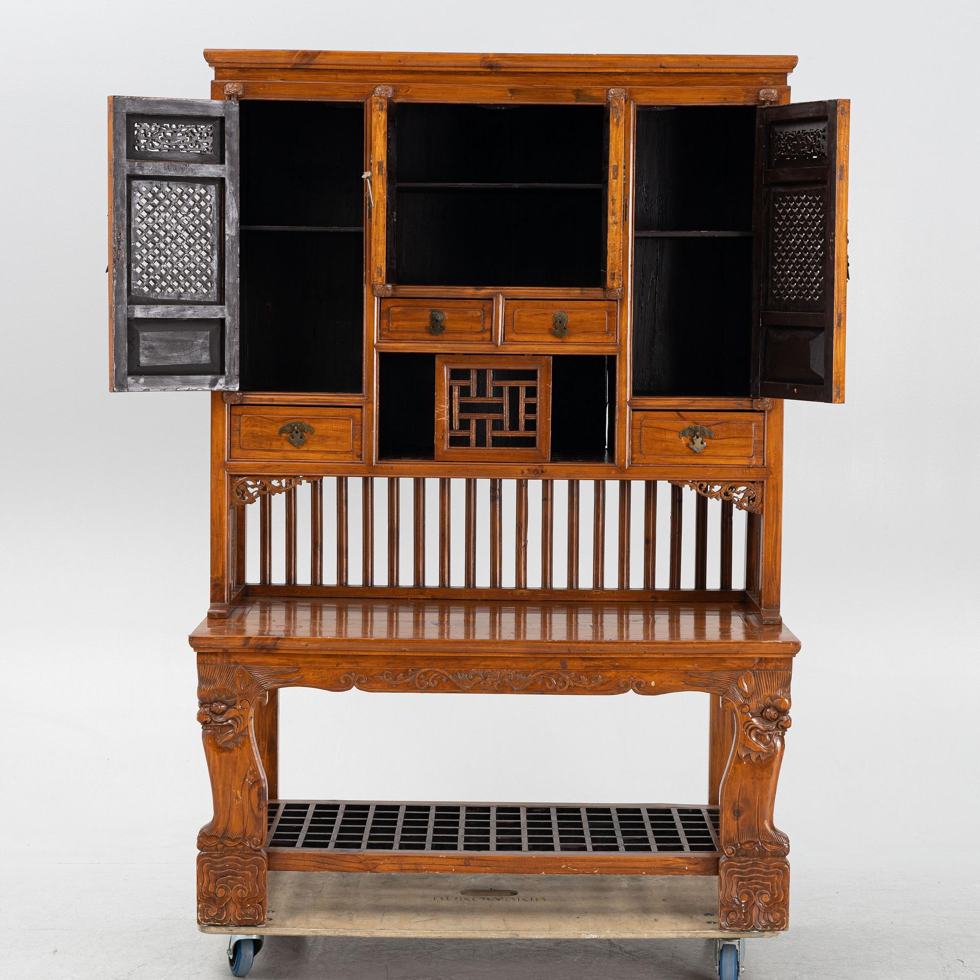 A Chinese hardwood cabinet, around 1900.