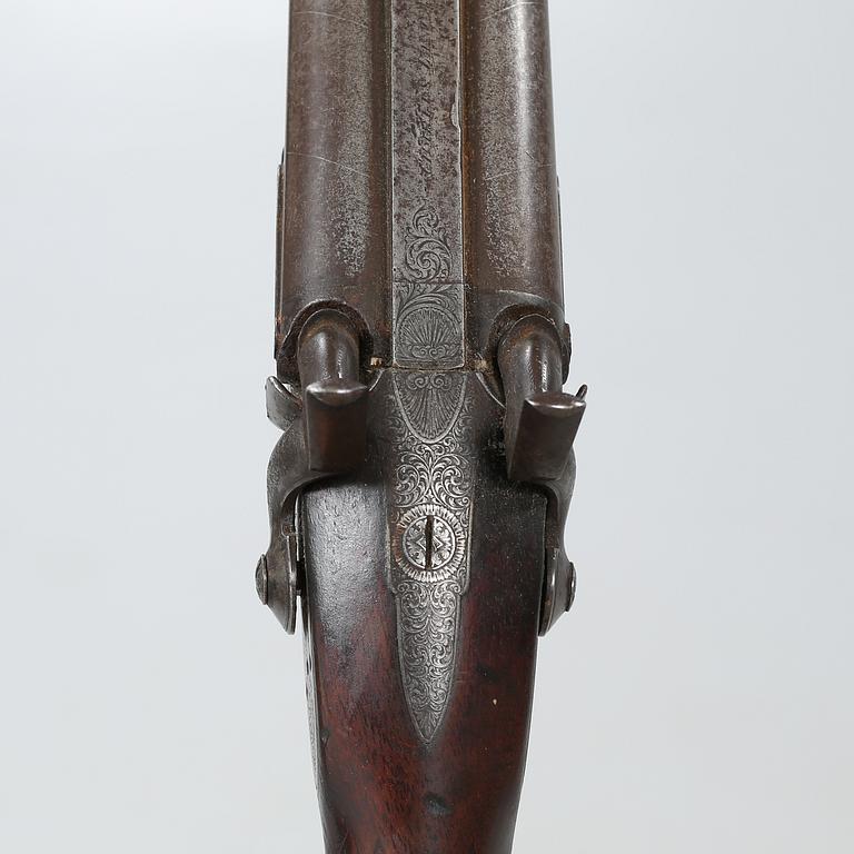 A percussion rifle by Charles William Lanchester in London, around the mid 19th century.