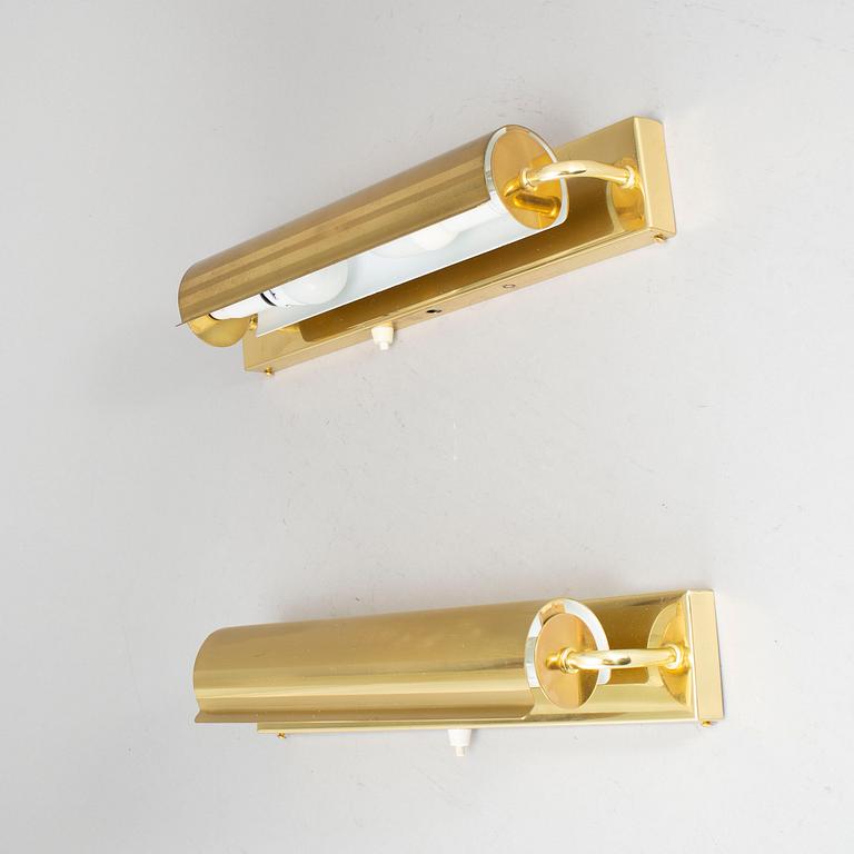 A PAIR OF BRASS WALL LAMPS FROM ÖIA.