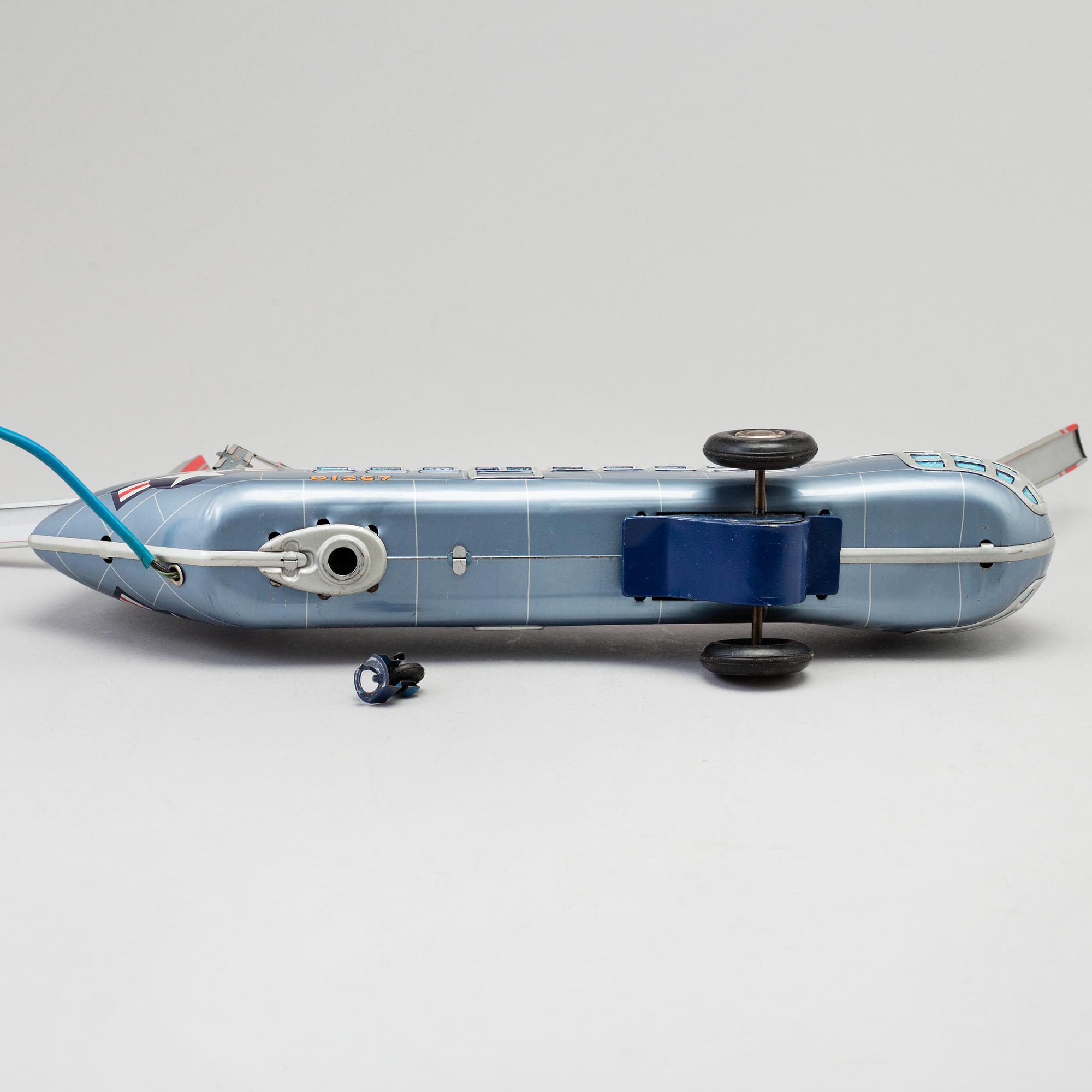 A toy metal car "Sunday Driver", Kosuge, Japan, and "Giant Helicopter", YF, Japan. 1960s.