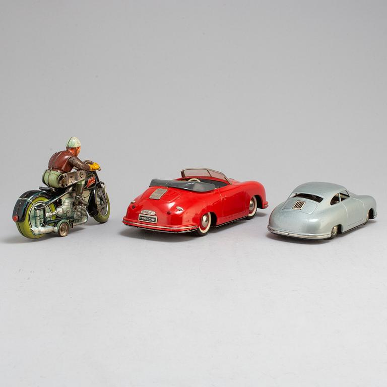 2 TOY CARS and 1 MC. Distler Porsche, JNF Prototype Porche, Arnold MC, mid 20th century.