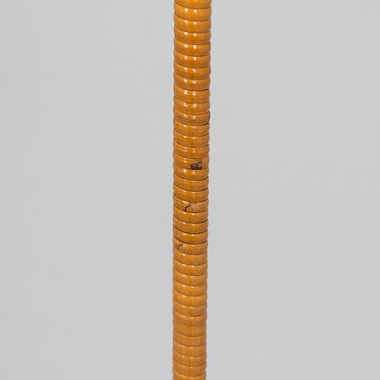 Paavo Tynell, a mid-20th century K10-10 floor lamp for Idman.