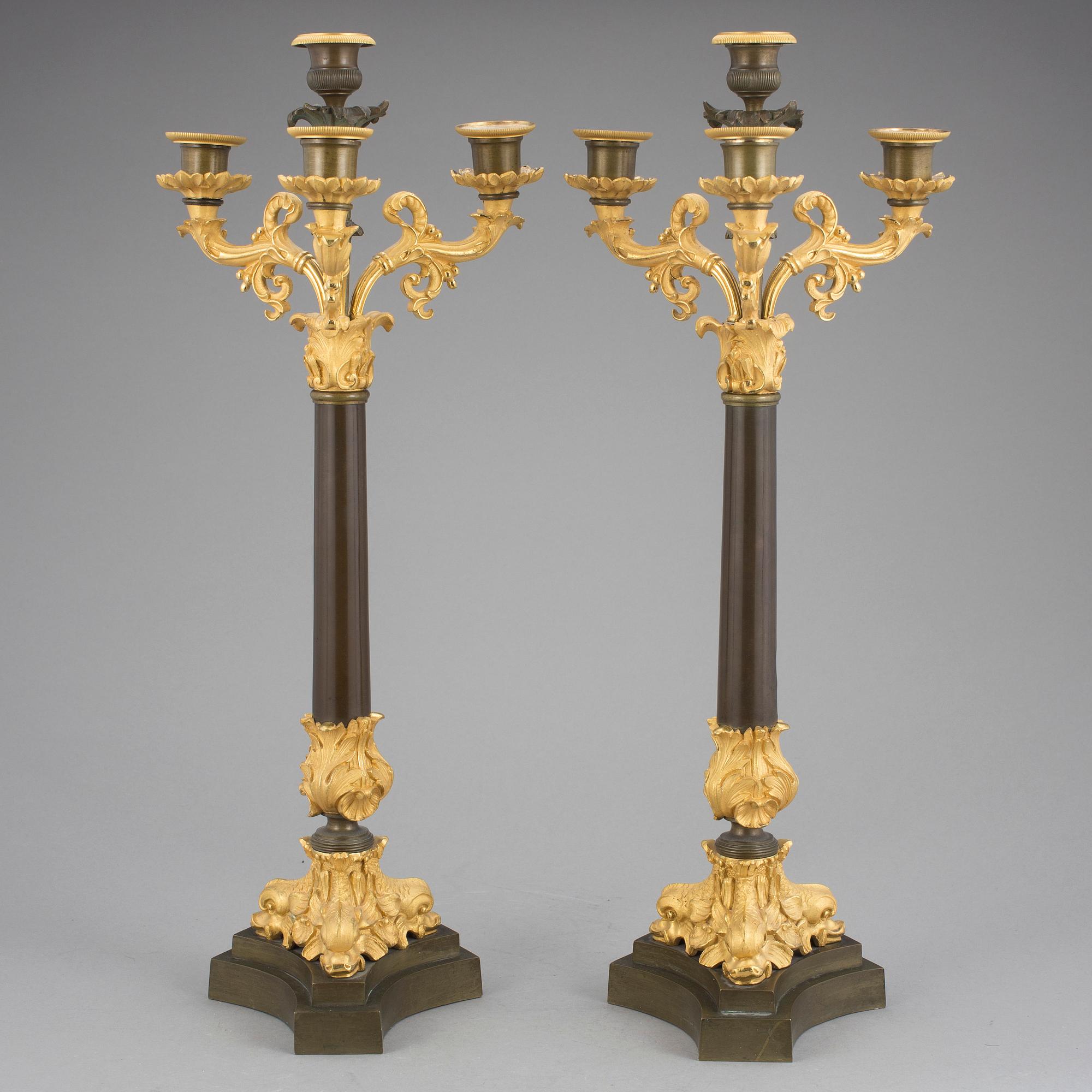 KANDELABRAR, ett par. Förgylld och patinerad brons. Senempire Frankrike, 1800-talets mitt.