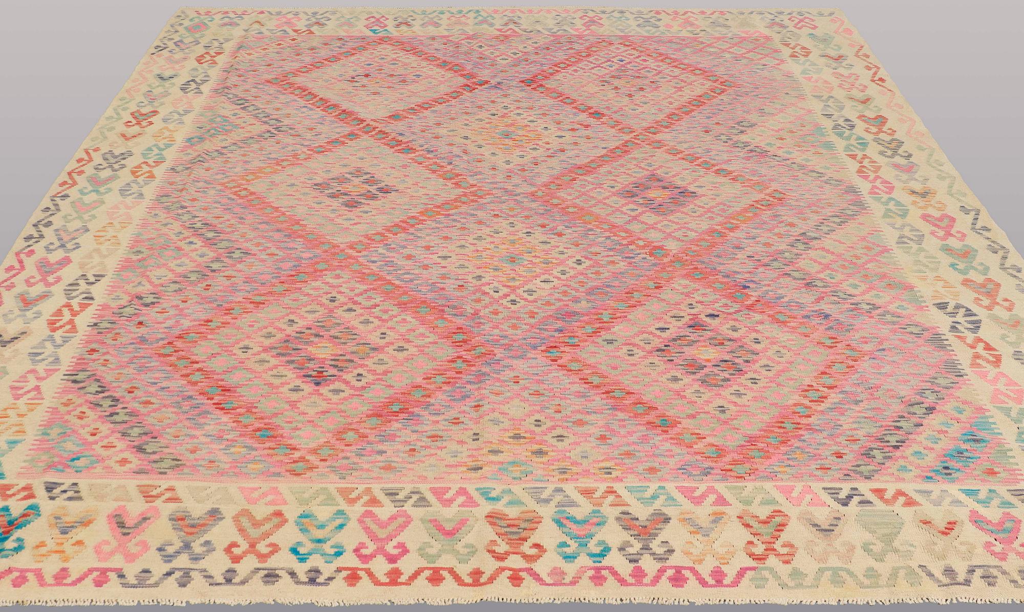 A CARPET, Kilim, ca 292 x 265 cm.