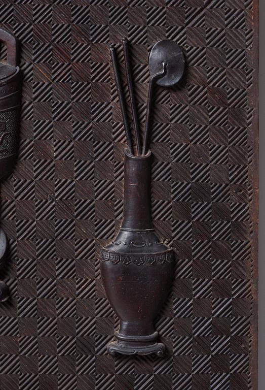 A carved wooden panel, Qing dynasty (1664-1912).