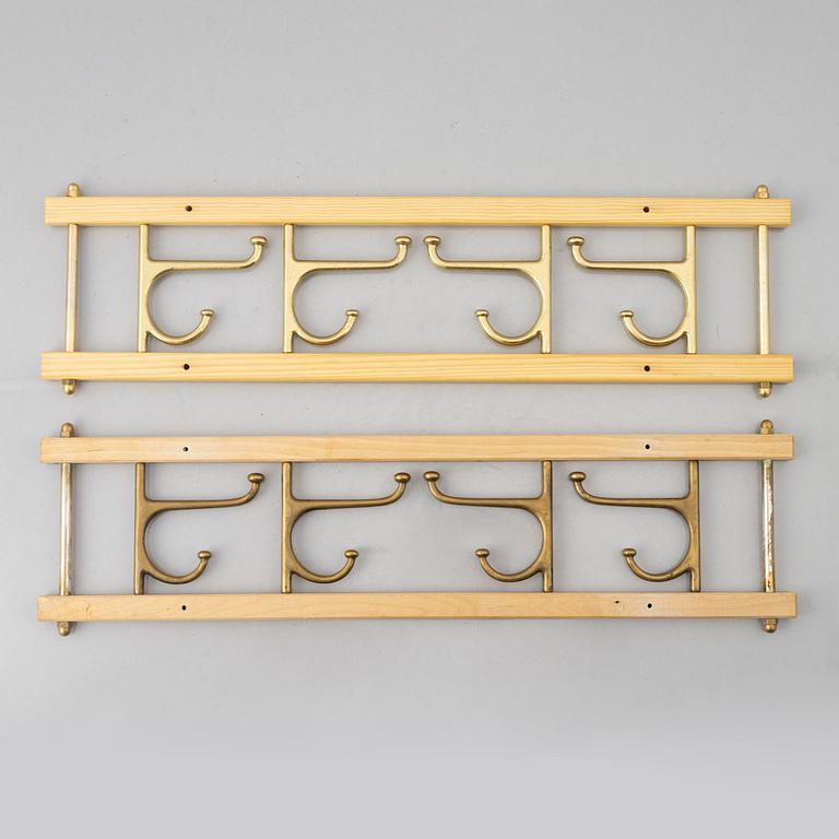 A pair of 'Dekorativ' coat hangers, Skoglunds metallgjuteri, Anderstorp, 1950's/60's.