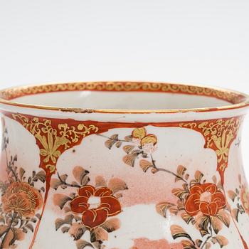 A Japanese porcelain vase from the Meiji period (1868-1912) .