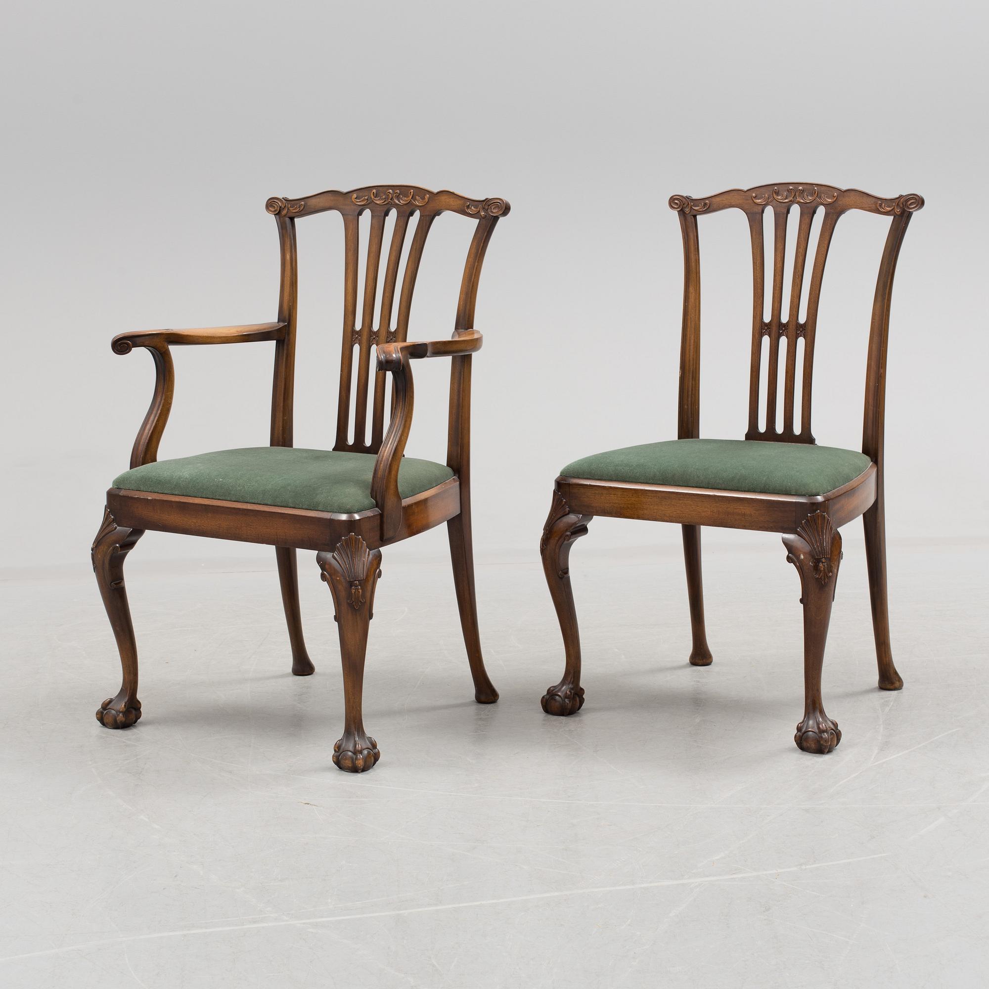 A late 20th century 10 piece Chippendale dining group.