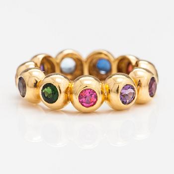 An 18K gold ring with different gemstones. Ofelia Jewelry, Helsinki.