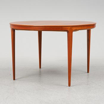 BERTIL FRIDHAGEN, a seven  piece walnut dining suite from Bodafors.