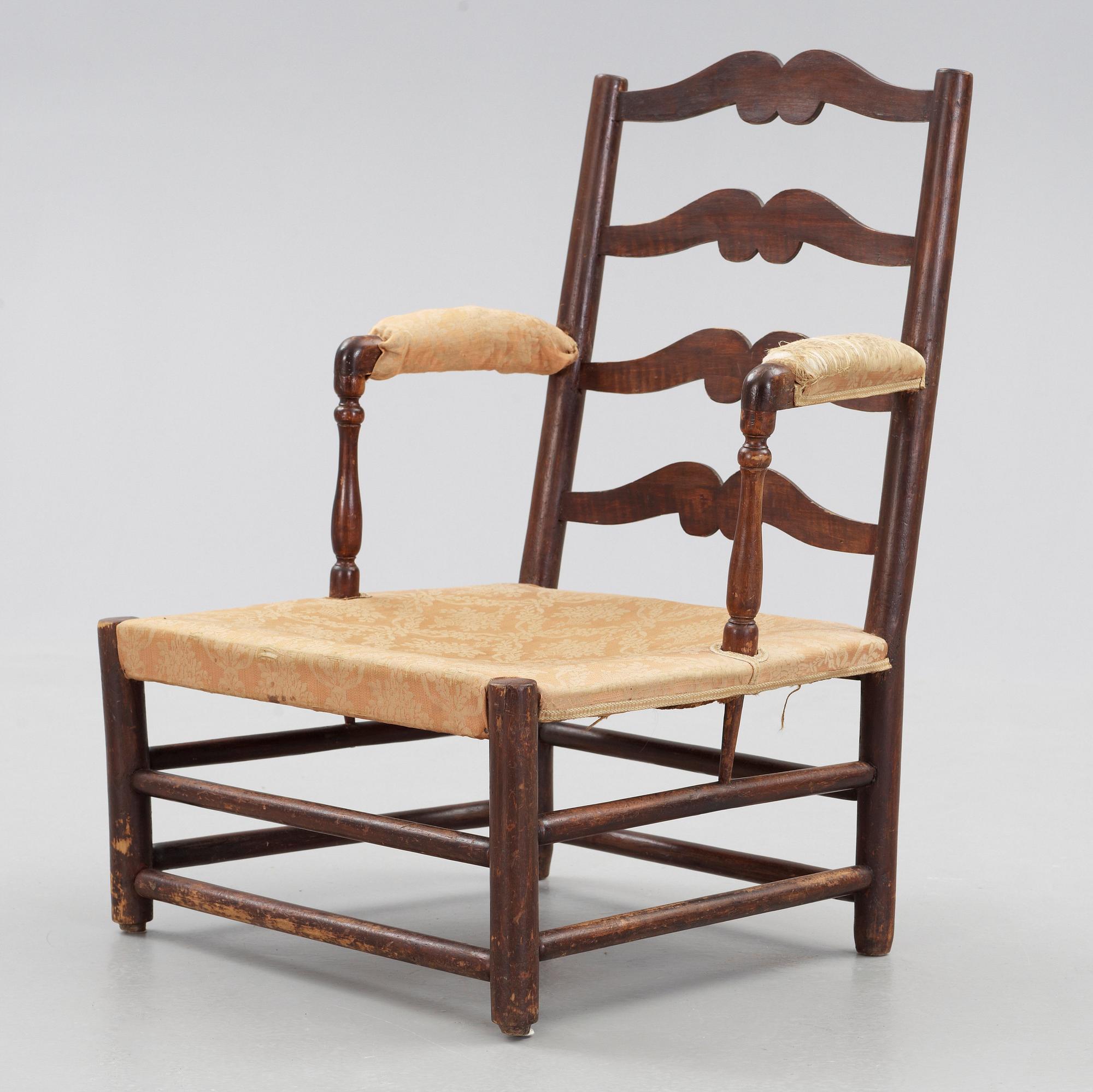 A Swedish Royal "Gripsholm" armchair.