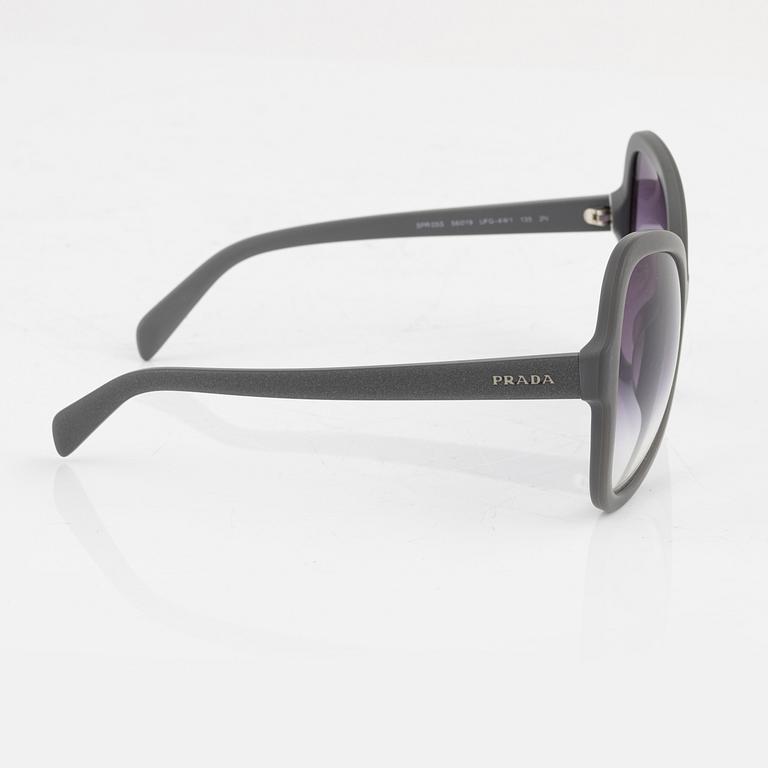 Prada, A pair of grey sunglasses.