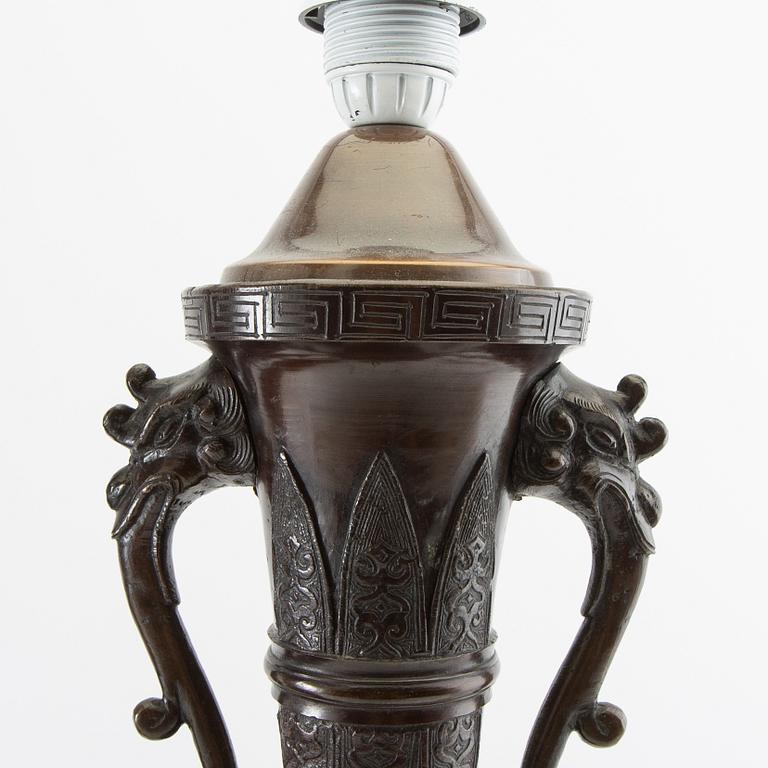 Table lamps a pair China 20th century patinated metal.