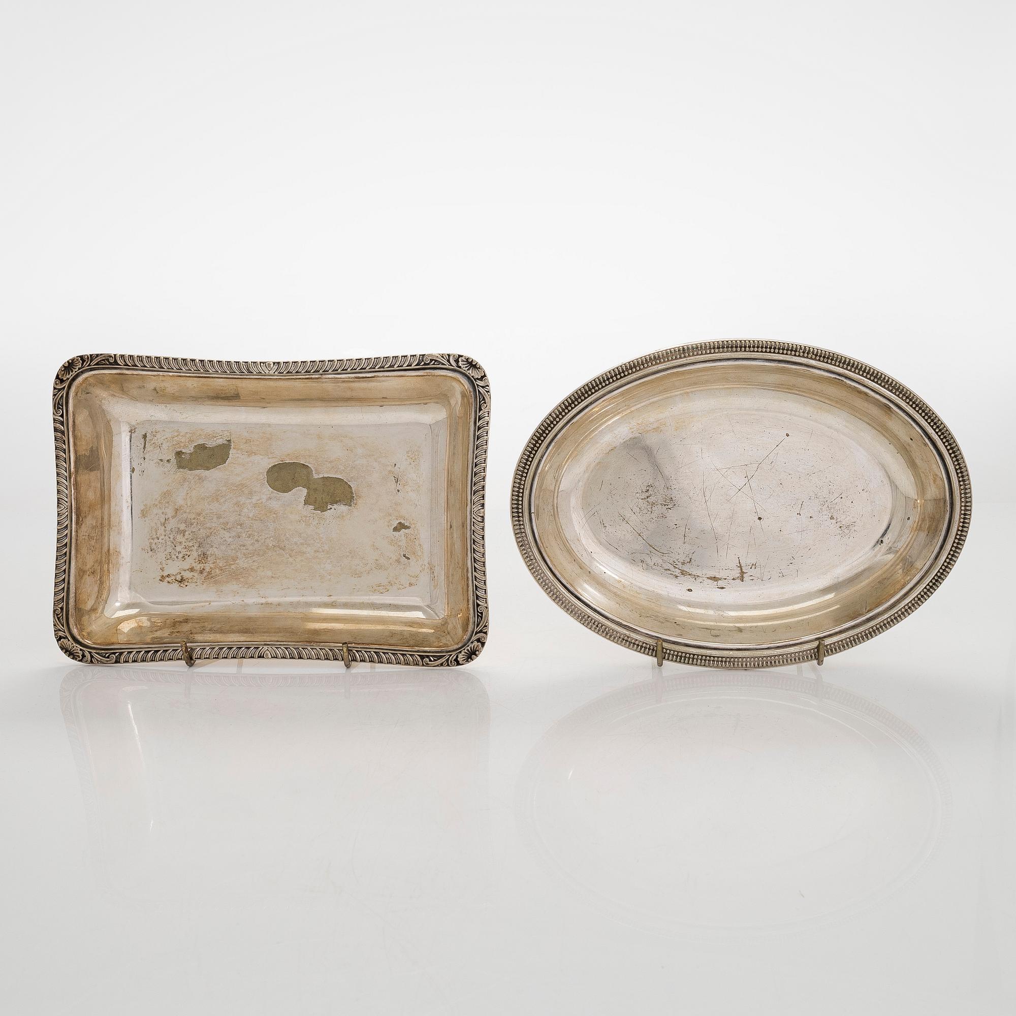 A set of four silver plated entree dishes, England.