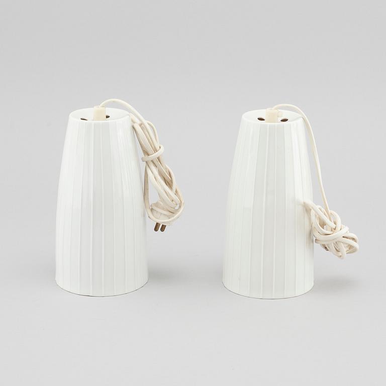 A pair of porcelain window / ceiling lamps, designed by Carl-Harry Stålhane for Rörstrand, in production 1954-55.