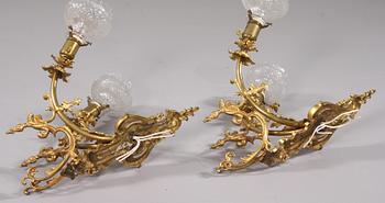 VÄGGLAMPETTER, ett par, Louis XV-stil, 1900-tal.
